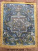 A 19thC Tibetan thanka depicting a Mandala to the centre surrounded by deities and Buddhist gods,
