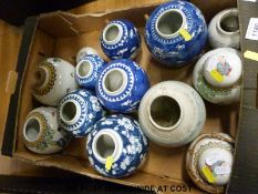 A Chinese lidded vase with prunus decoration,