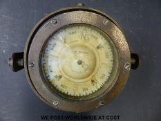 A brass gimballed ship's compass,