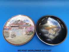 A Japanese Satsuma plate signed verso and a bronze plate,