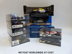 Nine Onyx and other diecast model F1 cars, all in original boxes.