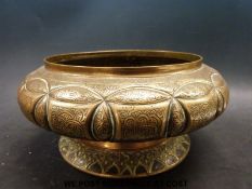 A Malay bronze bowl with engraved decoration, similar example in the British Museum (11cm tall,