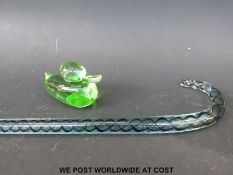 A glass walking stick and glass duck