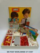 Three Lego building brick sets 810, 323 and 324,