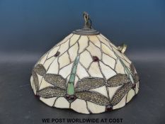 A Tiffany style light shade with dragonfly design,