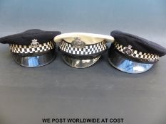 Three Elizabeth II police hats or caps to include Leicester & Rutland,