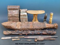 An African tribal carved musical instrument, head rest,