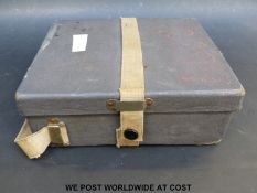 A pair of military binoculars in case marked x5 Bino Briam Mk4