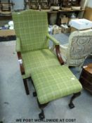 A mahogany piano stool raised on ball and claw feet and a Georgian style club chair