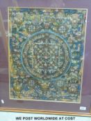 A Tibetan thanka depicting a Mandala to the centre surrounded by gods and deities