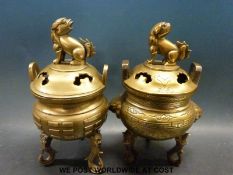 Two 19thC Chinese bronze censers with foo dog finials (26cm tall)