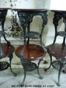Two mahogany and cast iron pub tables (H70cm,