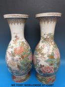 A pair of large Japanese pedestal vases decorated with peonies (47cm tall)