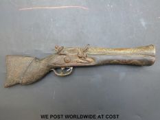 A hammer action flintlock blunderbuss with inlaid stock and 7.