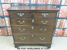 A Georgian oak chest of two over three graduated drawers raised on bracket feet (W92 x D47 x H94cm)