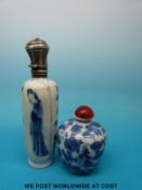 A Chinese blue and white scent bottle with court figure decoration and white metal top and another