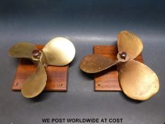 Two mounted brass/bronze ship or boat propellers