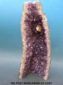 A large amethyst quartz geode with larger crystal formation (maximum diameter 15cm, 36cm wide,