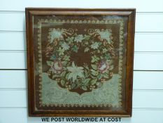 A Victorian embroidery of roses in a period frame (47 x 49cm)