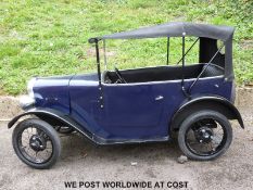 Austin 7 junior battery operated child's car with retractable hood, lights and spare wheel,