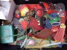 A large quantity of Meccano parts to include girders, wheels, Meccano transformer,
