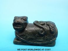 A 19thC Chinese jadeite model of a foo dog