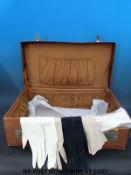 A leather suitcase by F Lansdowne, 53 Jermyn Street, S.W.