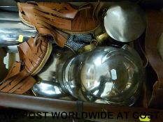 A replica chain mail tunic, two replica helmets including Roman style, swords,