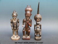 Three African tribal figures (tallest 27cm)