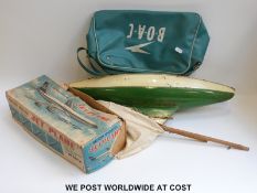 Tri-ang yacht and a Marx Jet plane in original box together with a vintage BOAC cabin bag