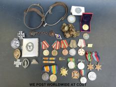 A WWI medal pair awarded to 135494 Gnr J J George R A together with three WWII medals and various
