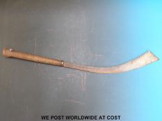 A Burmese or Cambodian, East Asian dha type sword with woven cane,
