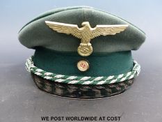 WITHDRAWN A replica WWII peaked German Nazi officer's cap