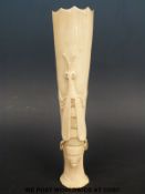 An Ivory vase carved with two crickets (19.
