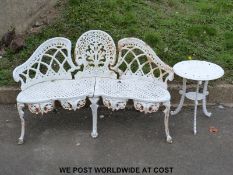 A Coalbrookdale style garden table (H58cm x 45cm diameter)