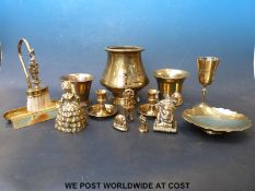 A collection of brassware to include a heavy urn, figure of Pan being ridden by Cupid,