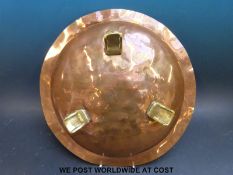 Birmingham Guild Arts & Crafts copper bowl with brass feet, diameter 35.