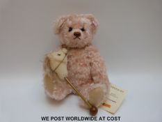 Steiff Original Teddy Bear 'Anna Bear with Hobbyhorse', 667800, with pink mohair, button to ear,