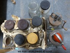 Two hand turned butter churns and a quantity of sweet jars