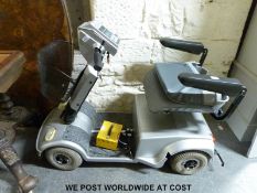 A Leader mobility scooter with charger and key