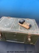 A metal ammunition box and Morse key