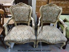 A pair of 19thC French style chairs with gilt detail and tapestry seats