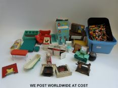 A collection of 1950s/1960s dolls' house furniture including kitchen,