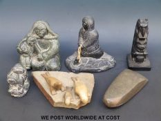 An Inuit figural group of three seals on a rock and two other items