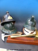 Four fire service helmets to include two ex Manders Brothers Paints of Wolverhampton together with