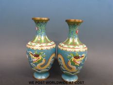 A pair of Chinese cloisonne vases decorated with dragons (23cm tall)
