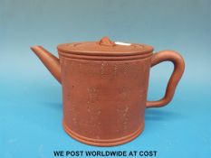 A Chinese Yixing teapot with calligraphy decoration (8.