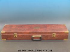 Leather brass bound gun case.