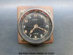 A WWII Spitfire or similar cockpit clock marked 6A/579 to dial and also No.