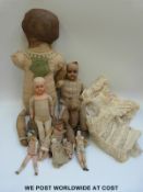 A collection of bisque headed,